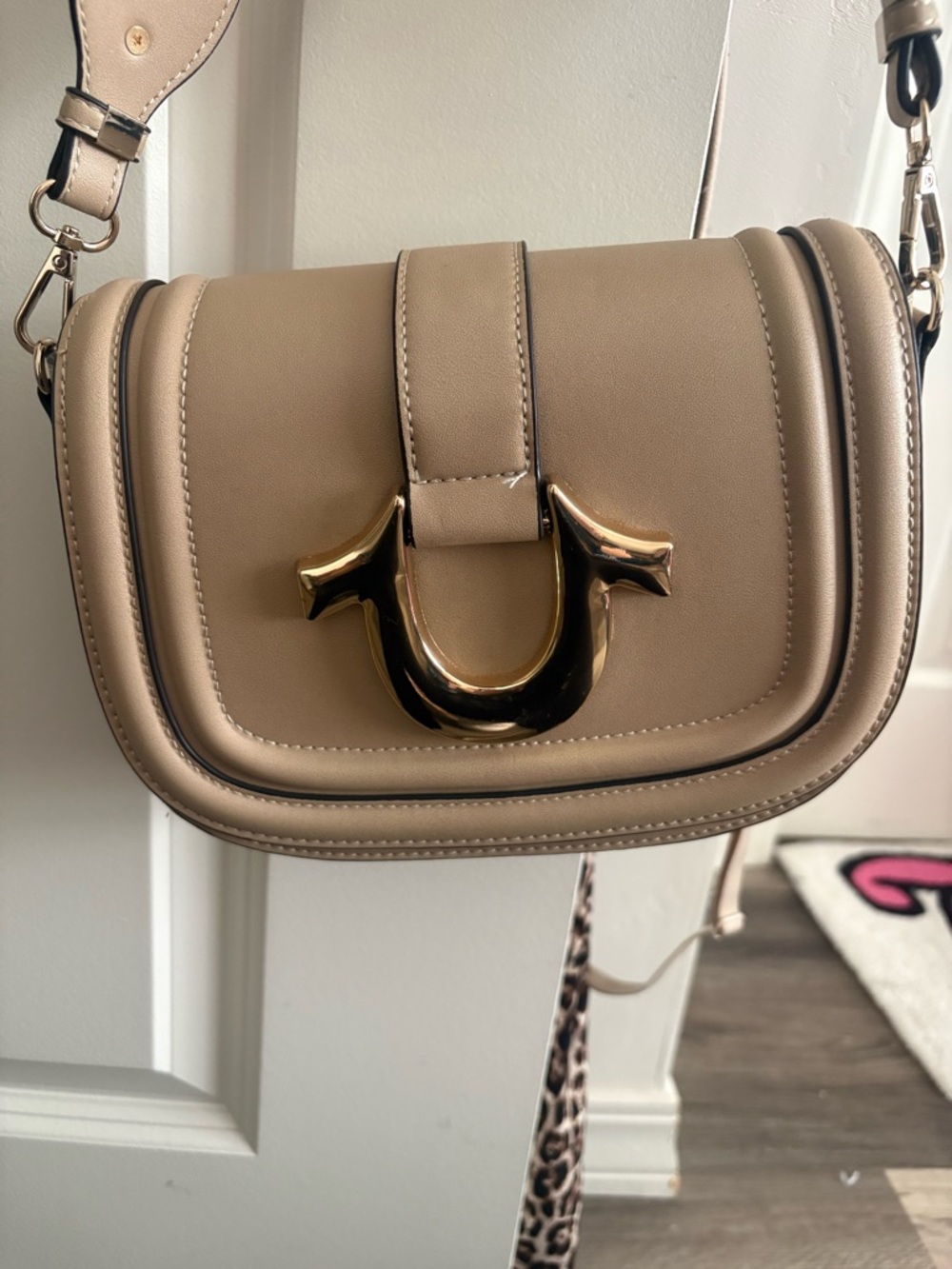 True Religion Beige Crossbody Saddle Bag with Gold Hardware
